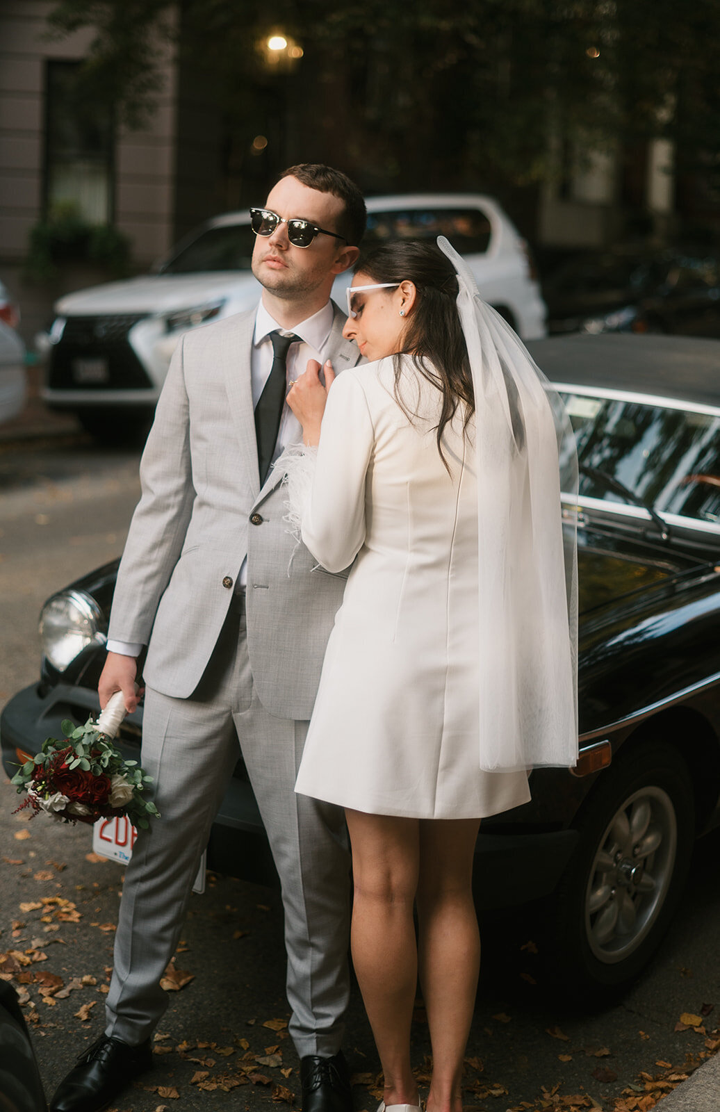 stylish-bride-groom-posing-car-jemima-richards-photography