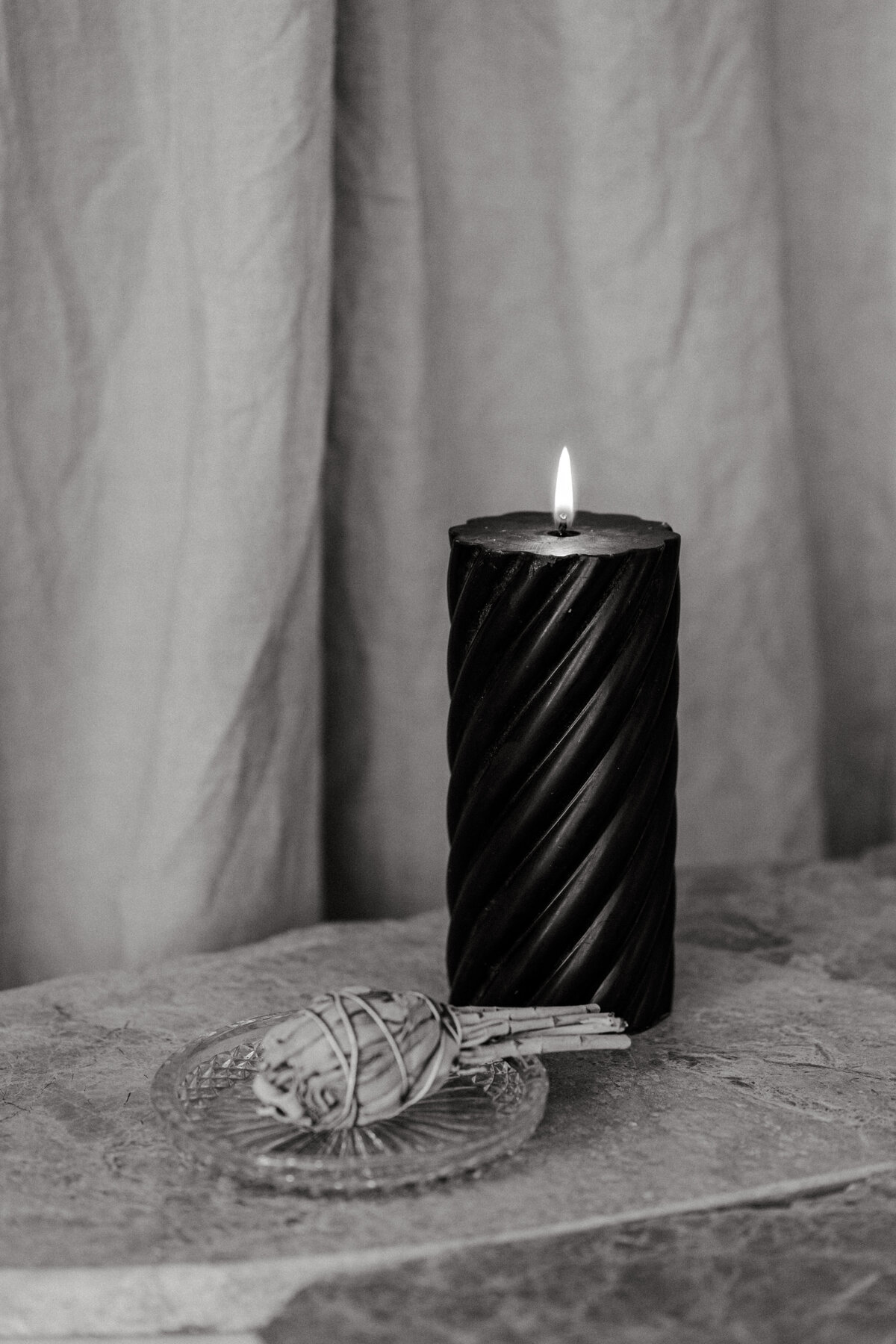 kaboompics_black-candle-sage-marble-table-24856