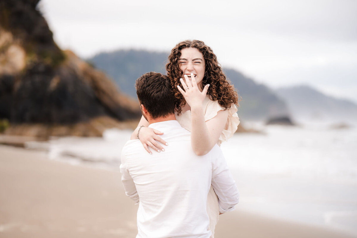 engaged woman showing her ring hand