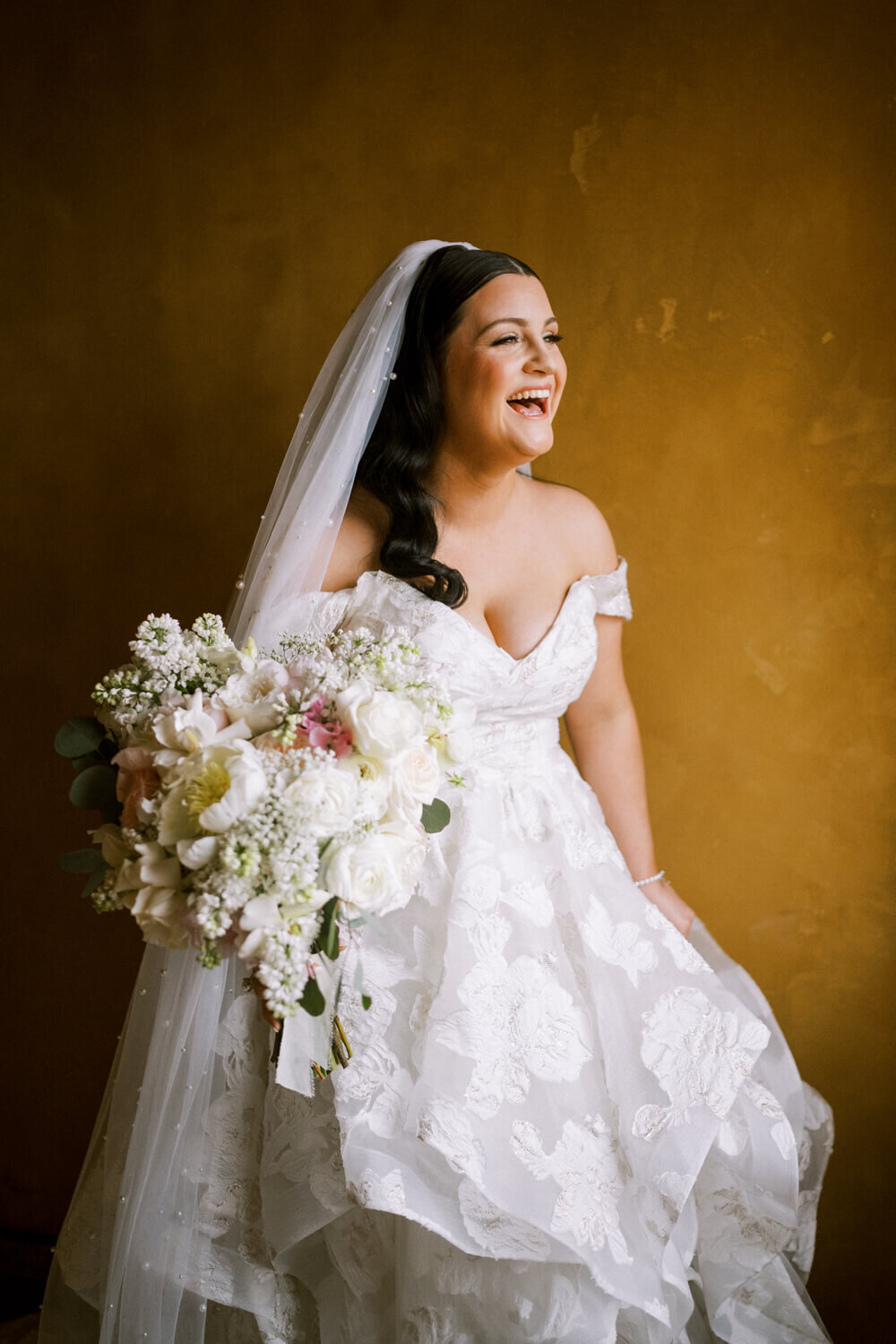 bride-laughing-during-portraits