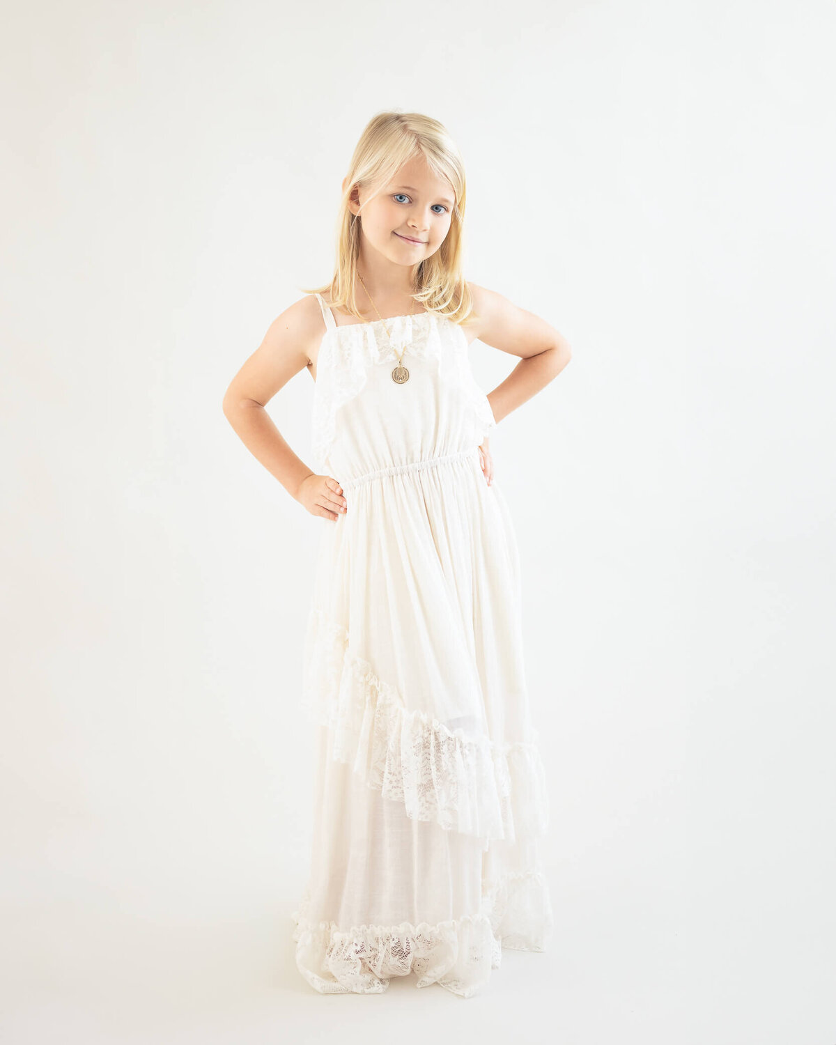 gorgeous child wearing a beautiful dress from Allison Amores Photography's Children's Client Closet