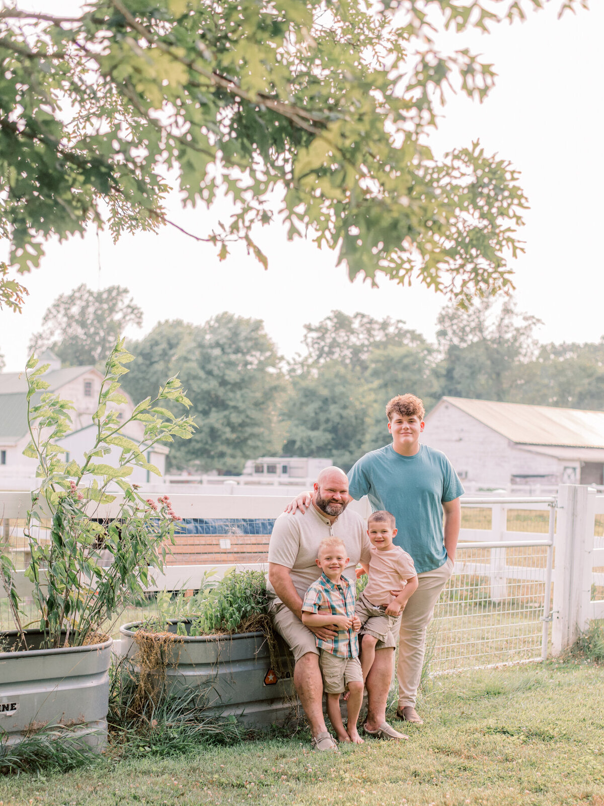 Dad and his three boys during family photo session.