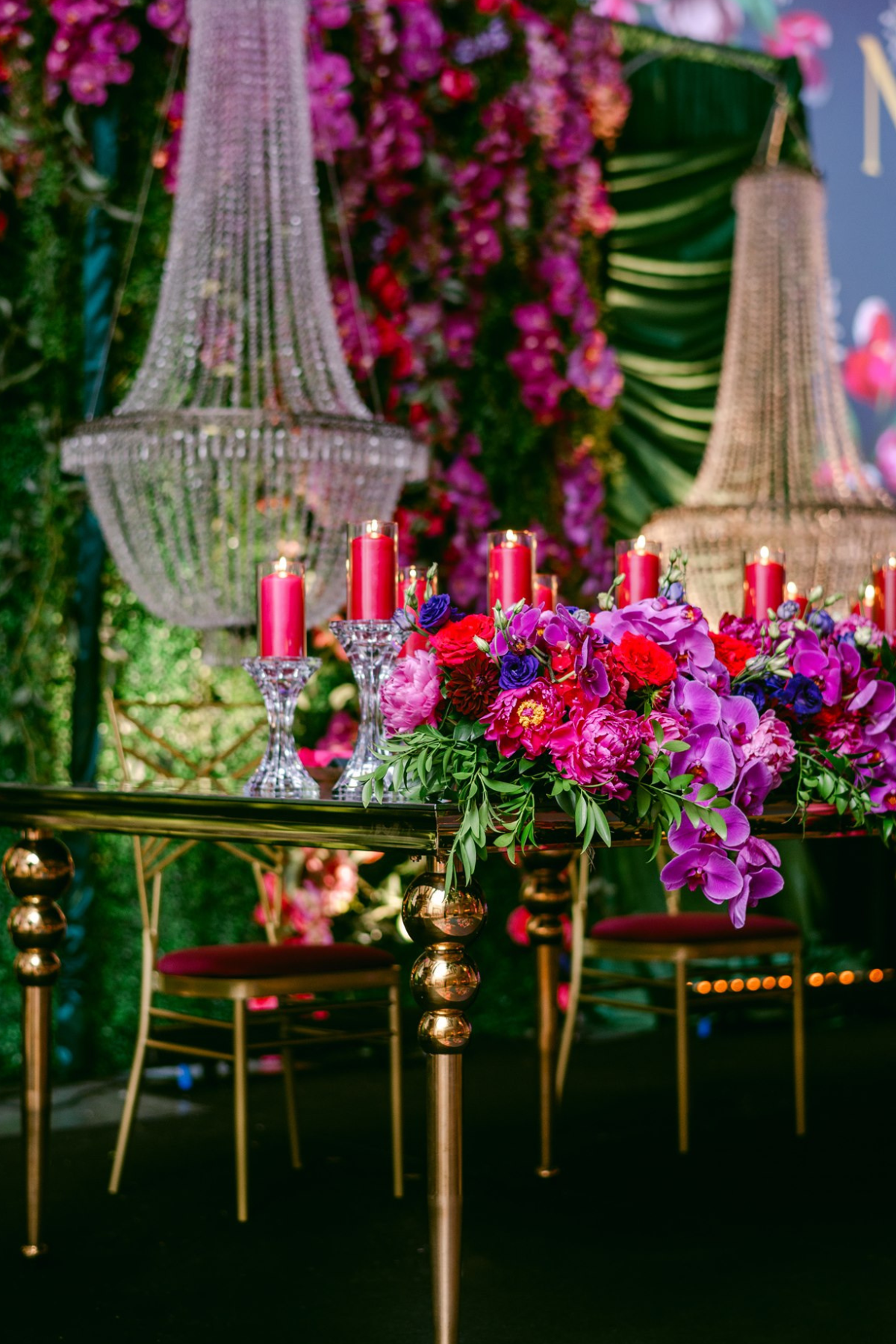 secret-garden-wedding-reception-greenery-pink-purple-gold-chandeliers-sweetheart