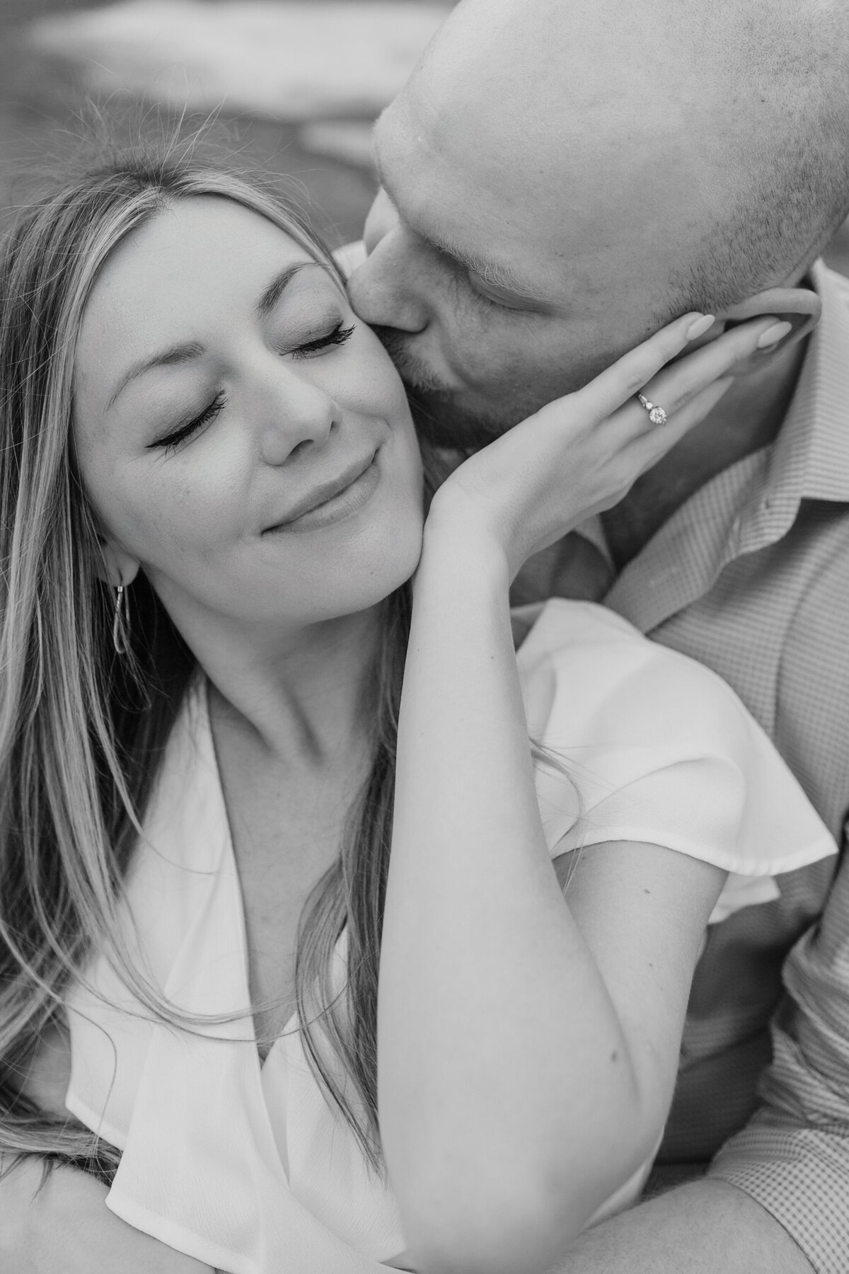 A romantic close up of a couple at Airfield Falls captured by Fort Worth Wedding Photographer, Megan Christine Studio