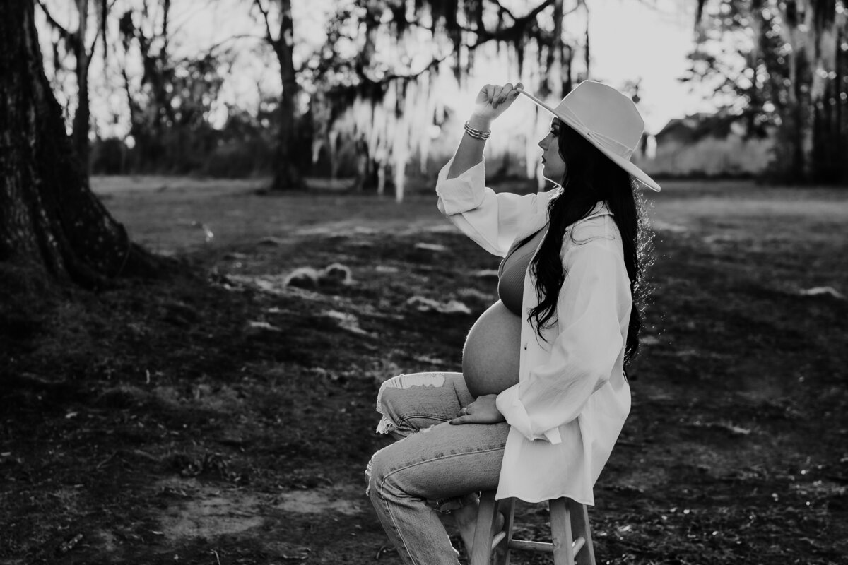 Black and white silhouette Sunset photos for pregnancy shoot with unbuttoned shirt and jeans in new Iberia, la
