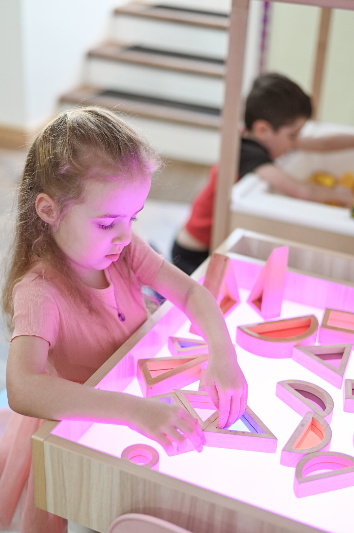Student playing at House of Parker Preschool Gorham Maine