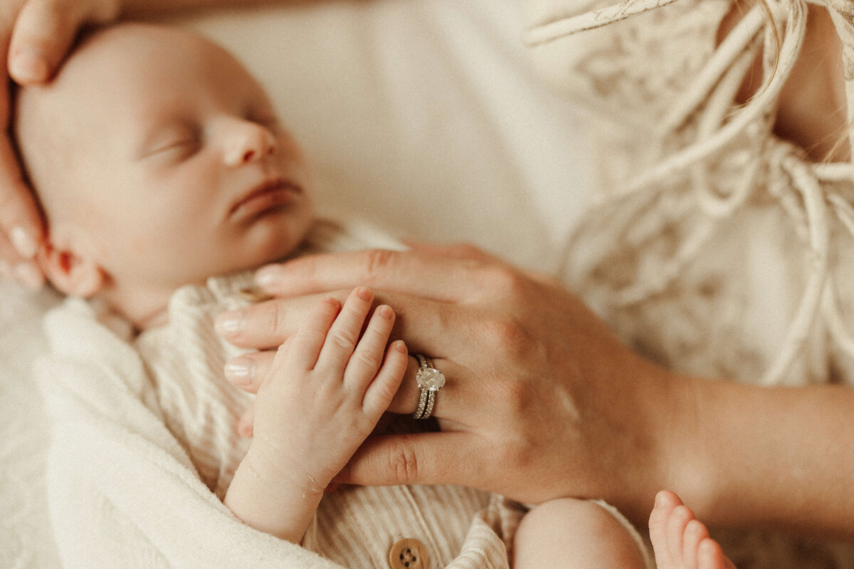Baby wrapped in neutral tones during Franklin TN in-home photo session