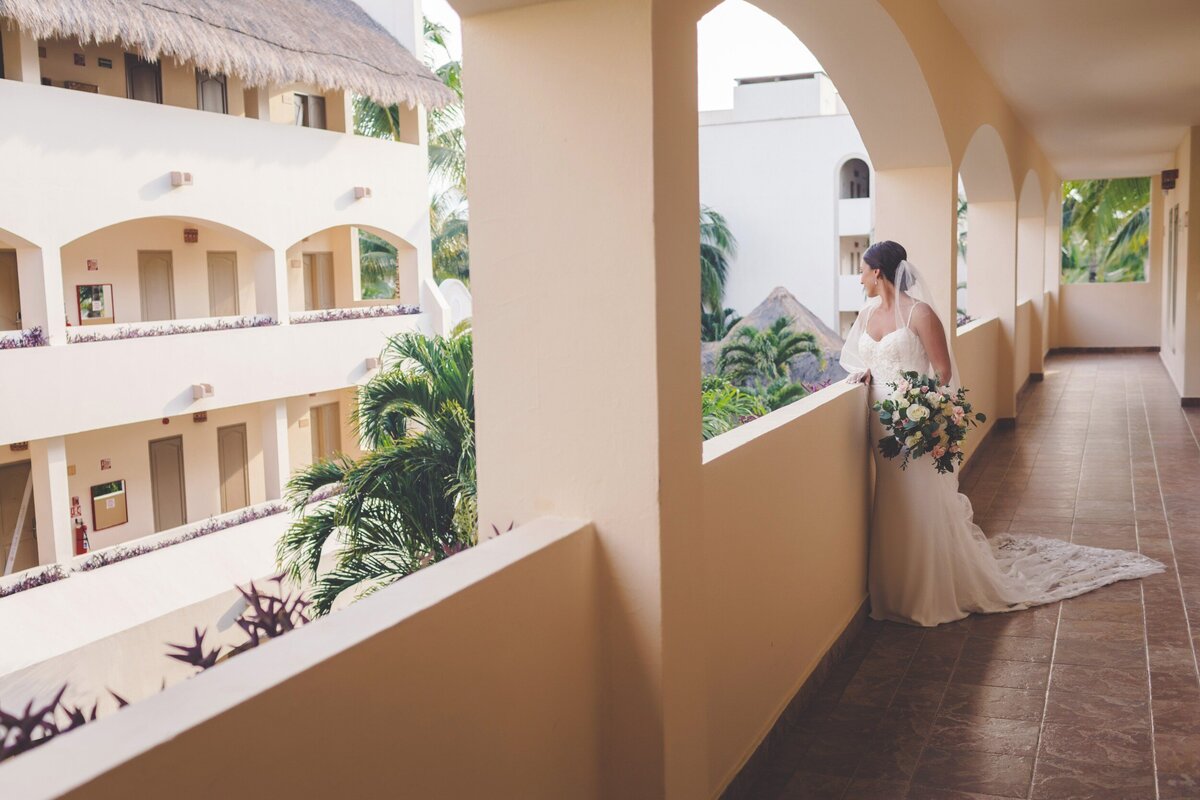 Bride standing in all before wedding in Riviera Maya