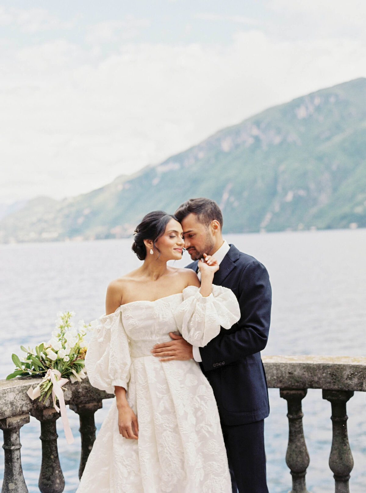 A wedding day photo of the bride and groom at Villa Aura del Lago on Lake Como in Italy