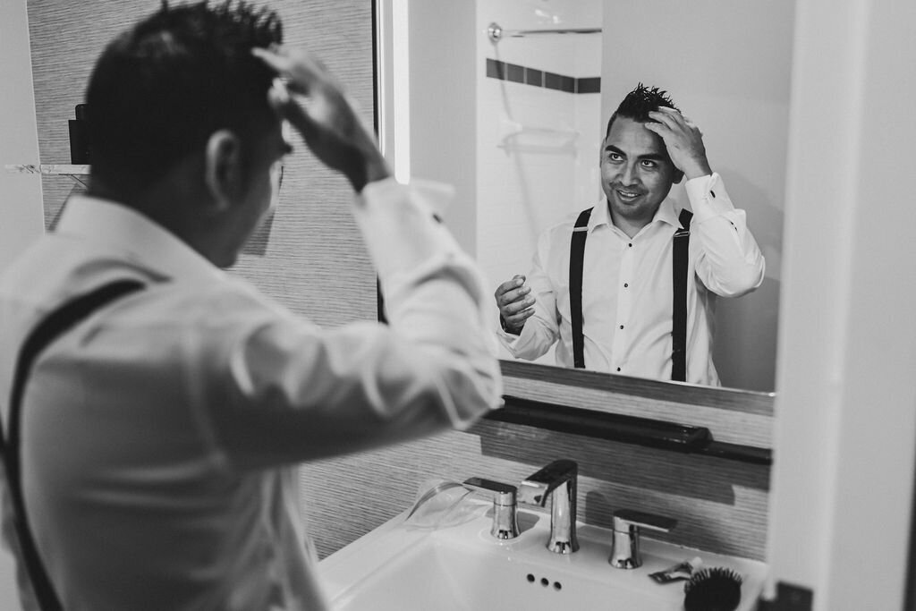 groom getting ready for wedding best photographer Potomac Point Winery _ Vineyard