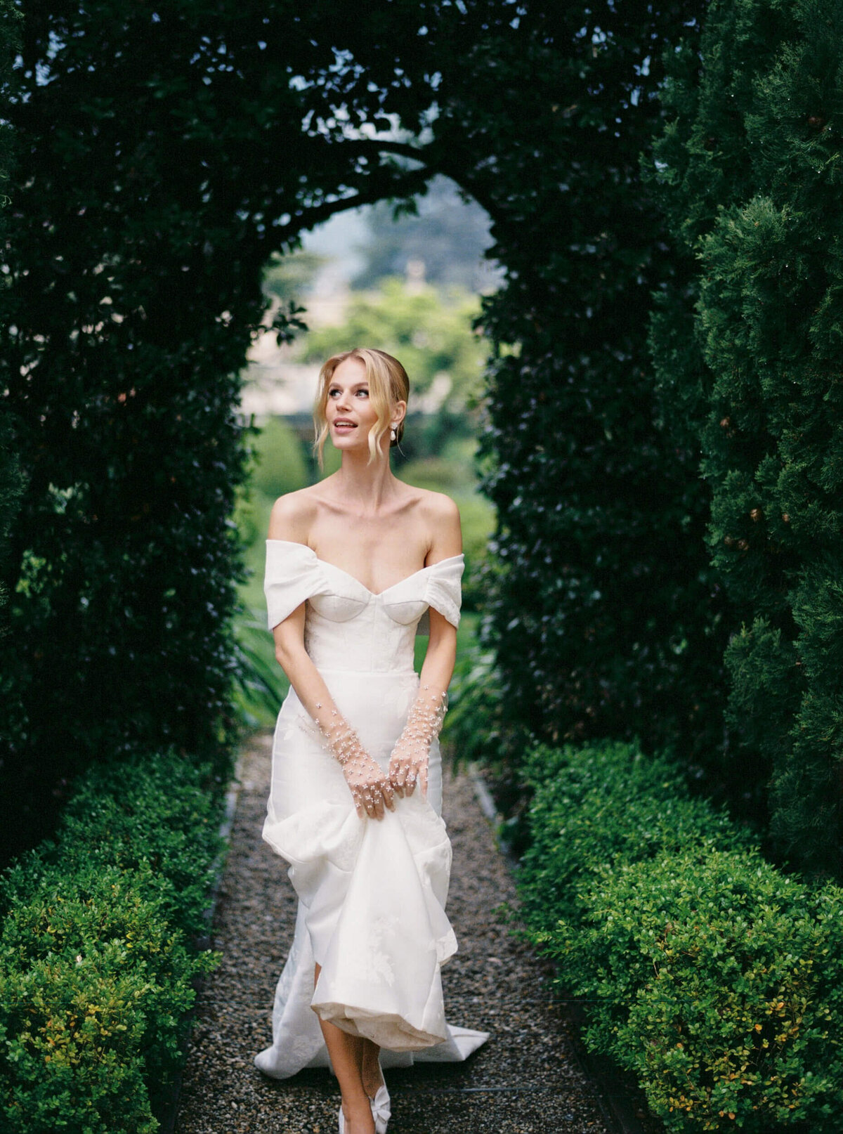 A wedding photo of a bride in her white wedding dress at Villa Balbiano on Lake Como in Italy
