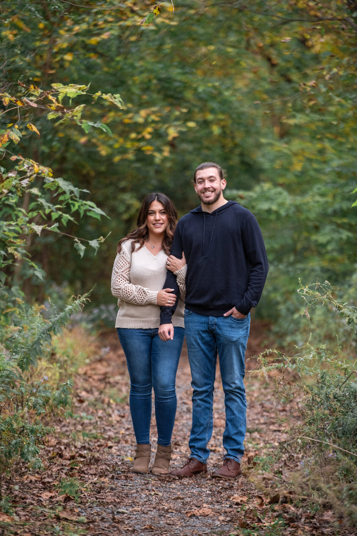 wooded_engagement_photo_holding_hands_1