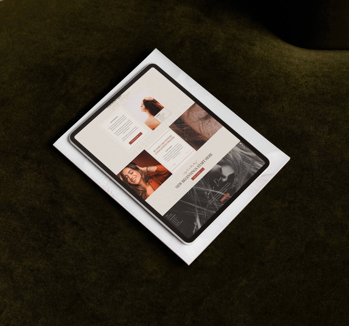 A tablet displaying a digital magazine lies on a black surface, highlighting our websites for salons.