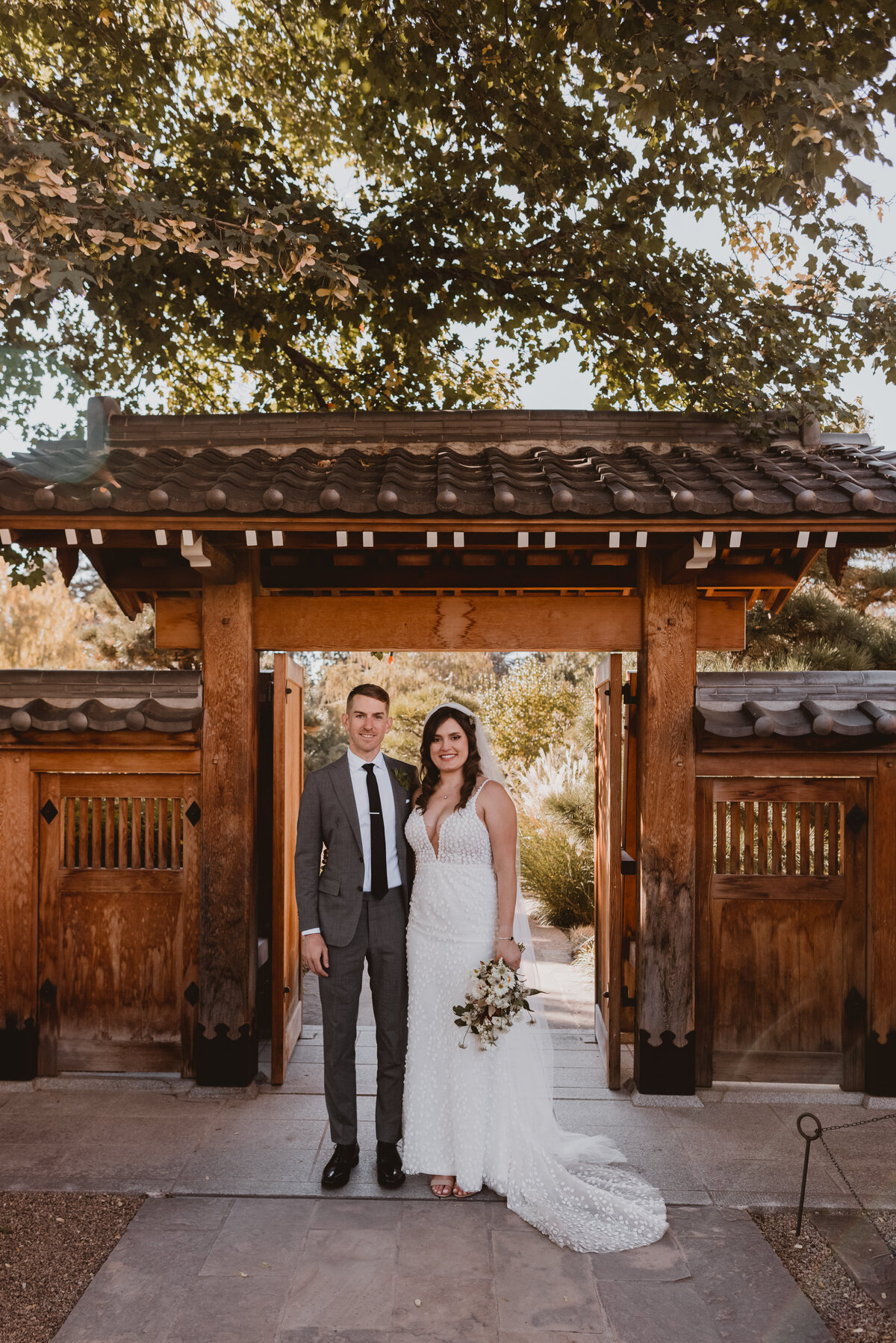 Bride and groom on their wedding day at the Denver Botanic Gardens.