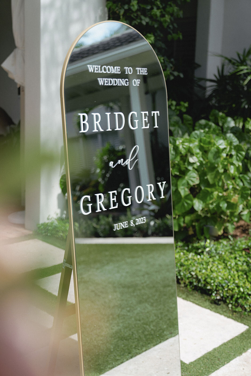 Mirror wedding welcome sign outdoors
