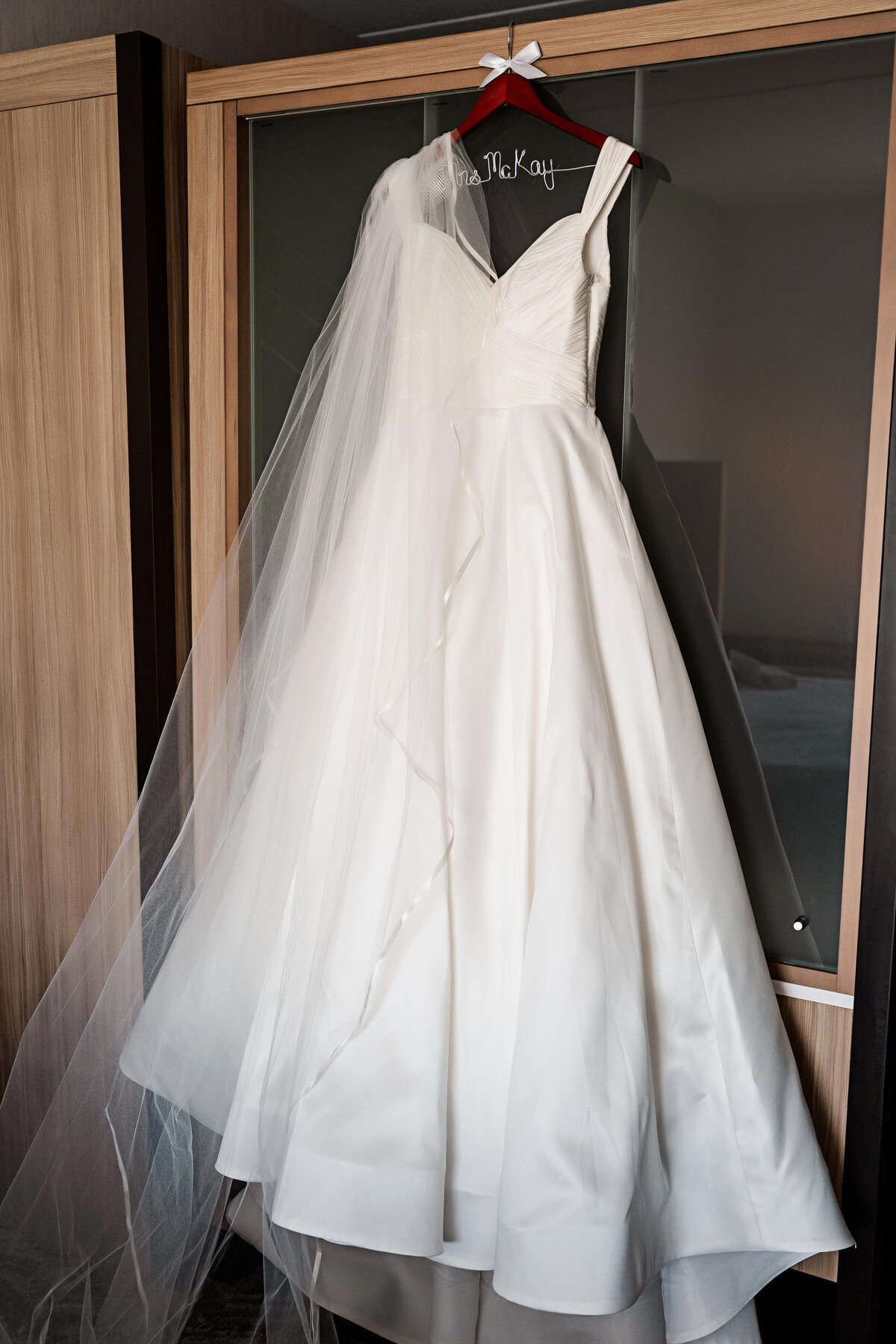 anne barge wedding dress hanging on wedding day