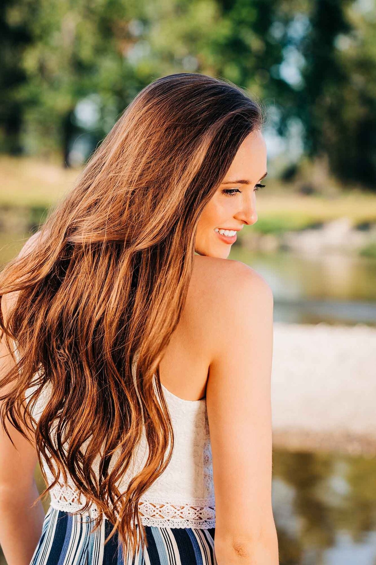 Senior photo of girl with long hair at Maclay Flat, Missoula