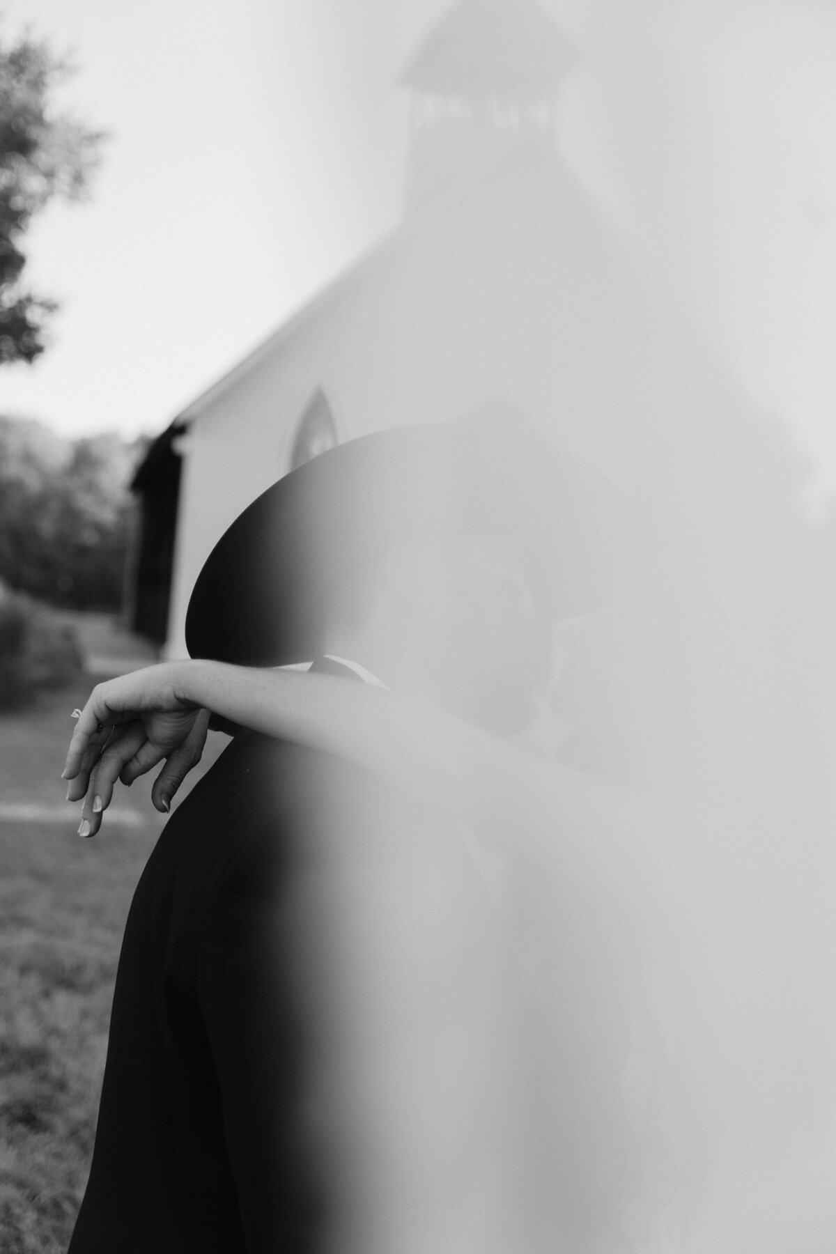 black and white image boot in stirrup