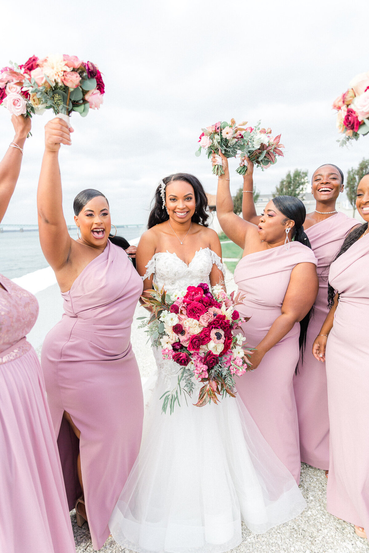 bridesmaids in pink mauve dress at Belle Mer the oceanfront luxury wedding venue (6)