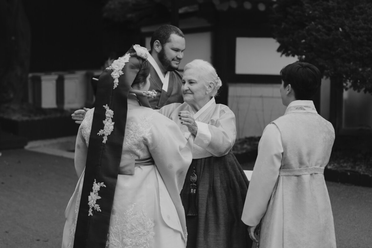 mother of the bride congratulates the couple