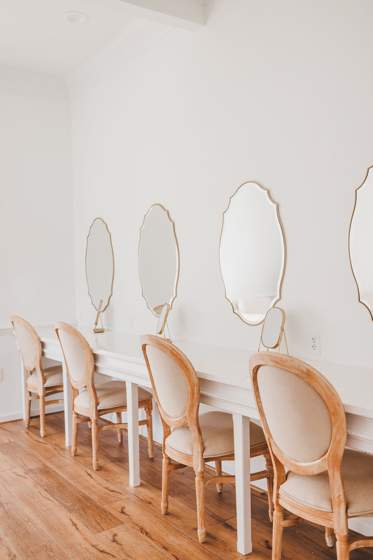 Vanity stations with mirrors in the bridal suite