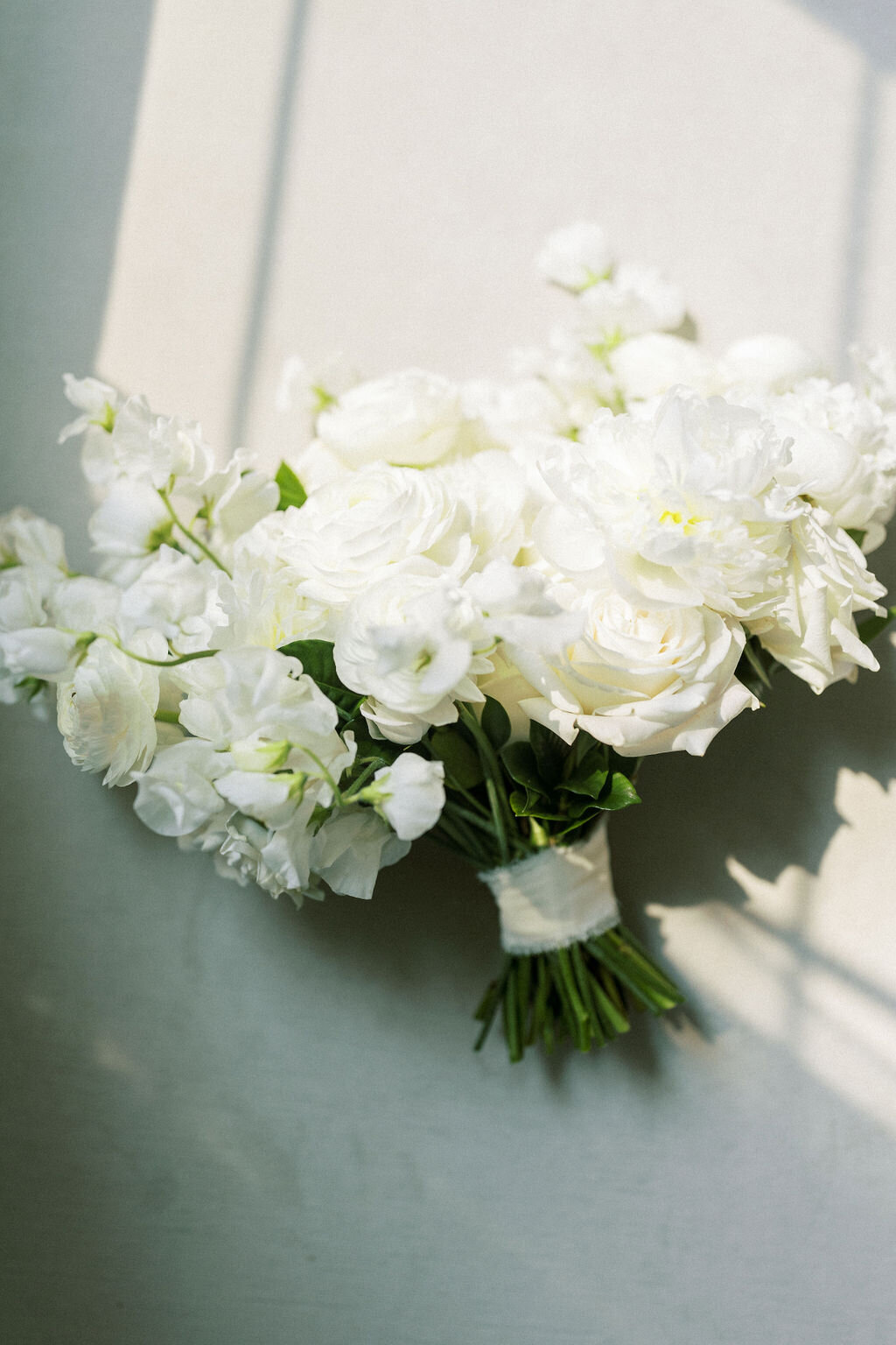 wedding photos chicago by Allison Francois Photography; image of wedding bouquet in sunlight