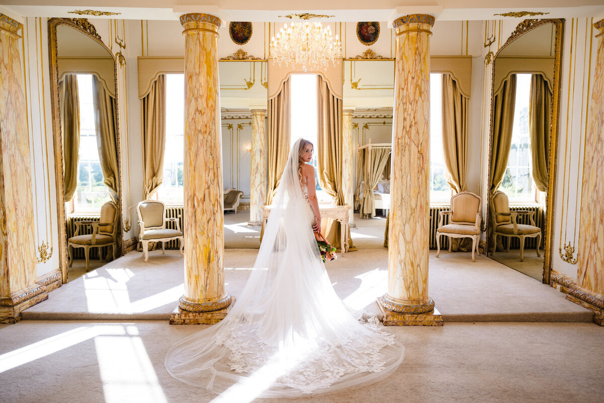 Bride in the bridal suite at Gosfield hall