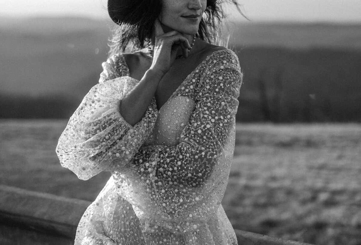 creative shot of elopement bride on roadside maryland mountaintop inspiration photo long beaded dress