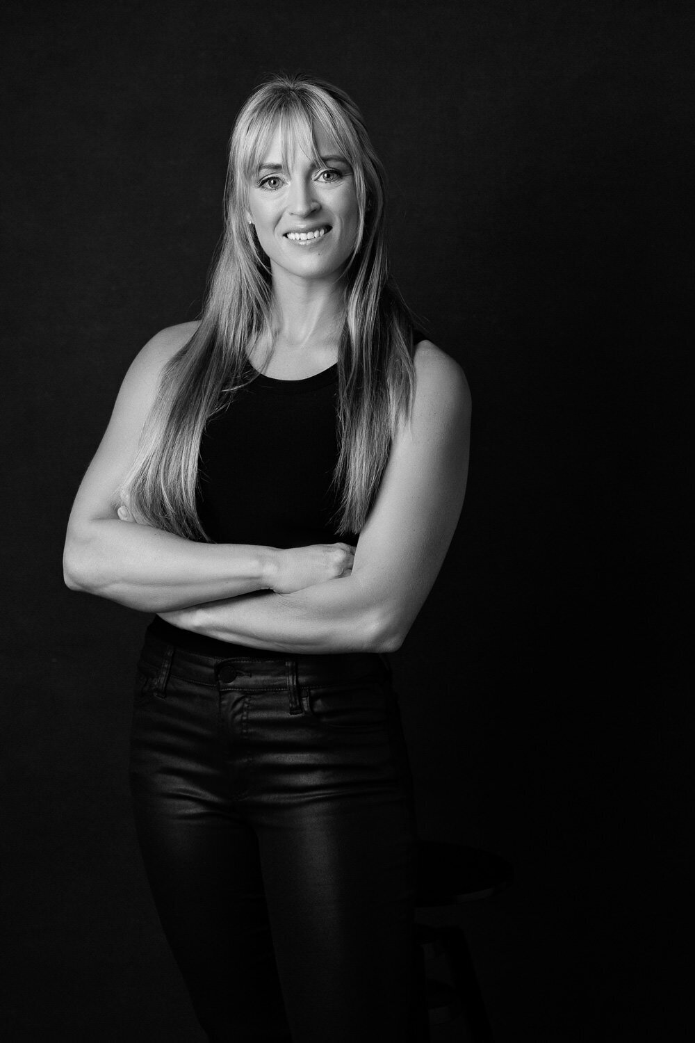 Clean and modern headshot session with black backdrop for clients in Austin, Texas.
