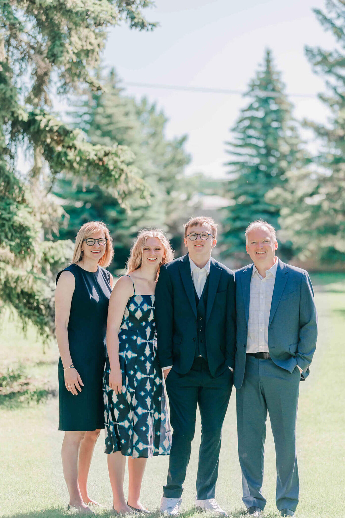 A family portrait in a park. 