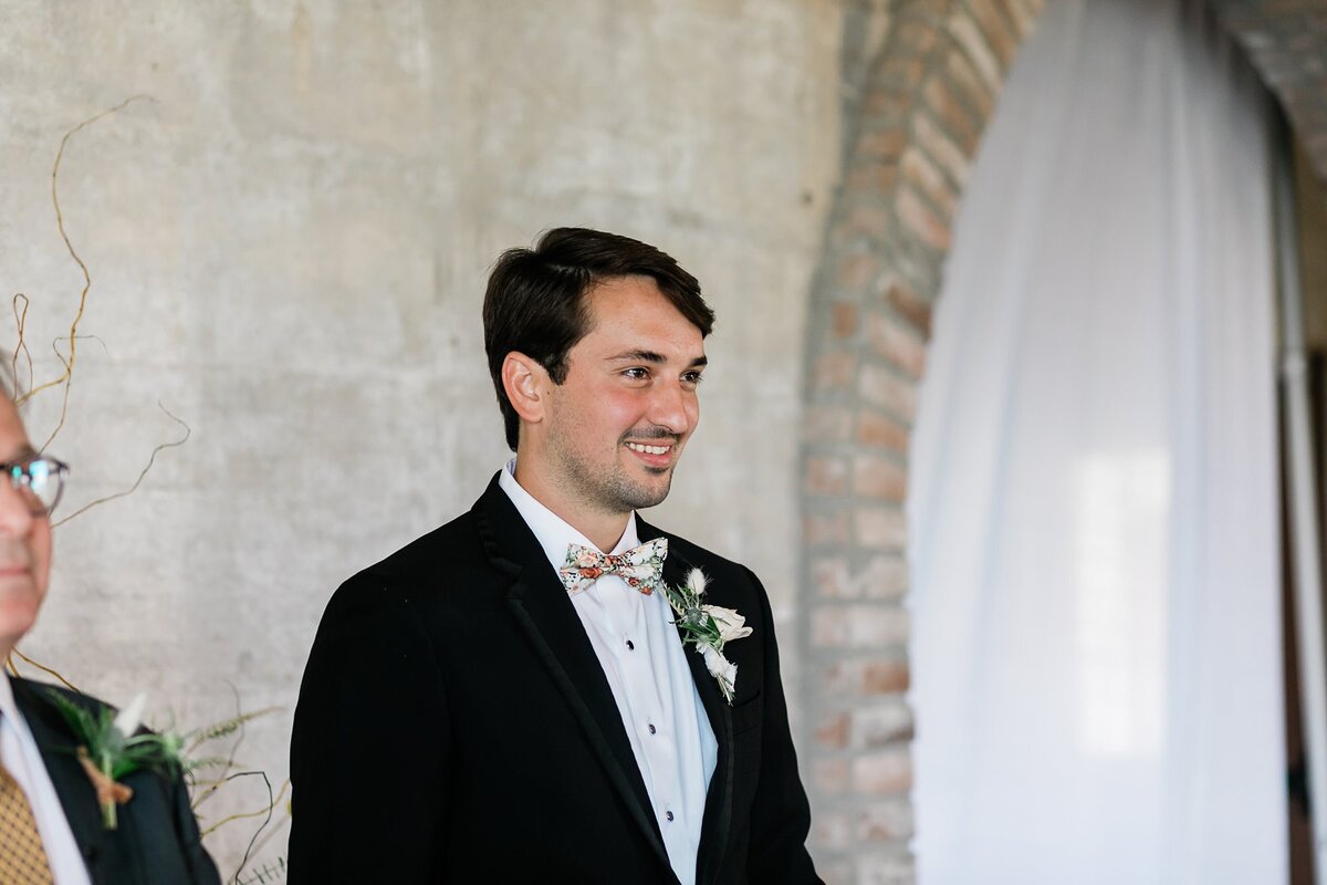 Groom's first reaction to bride walking down the aisle at Olde Dobbin Station.