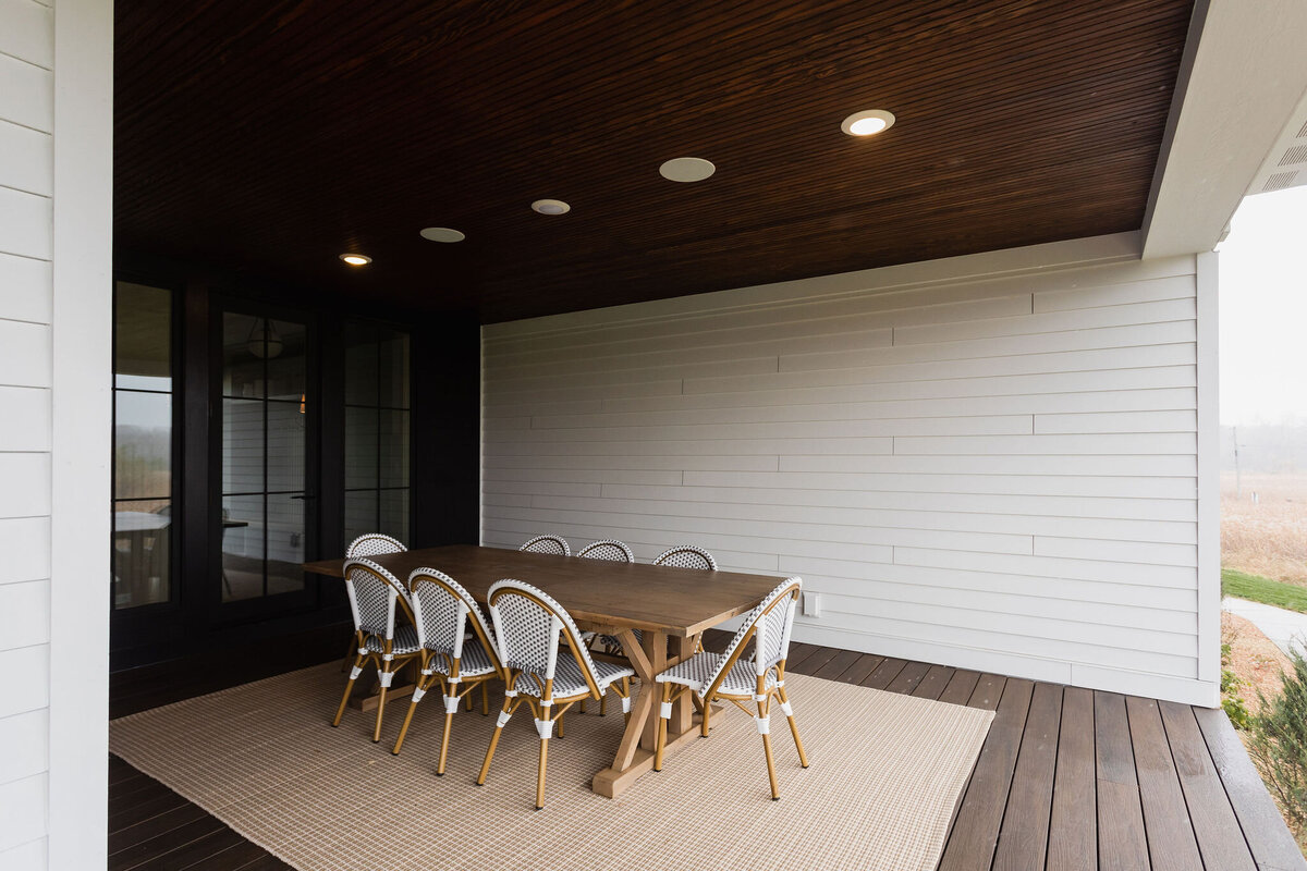 alma-homes-lake-minnetonka-builder-front-porch-dining-design