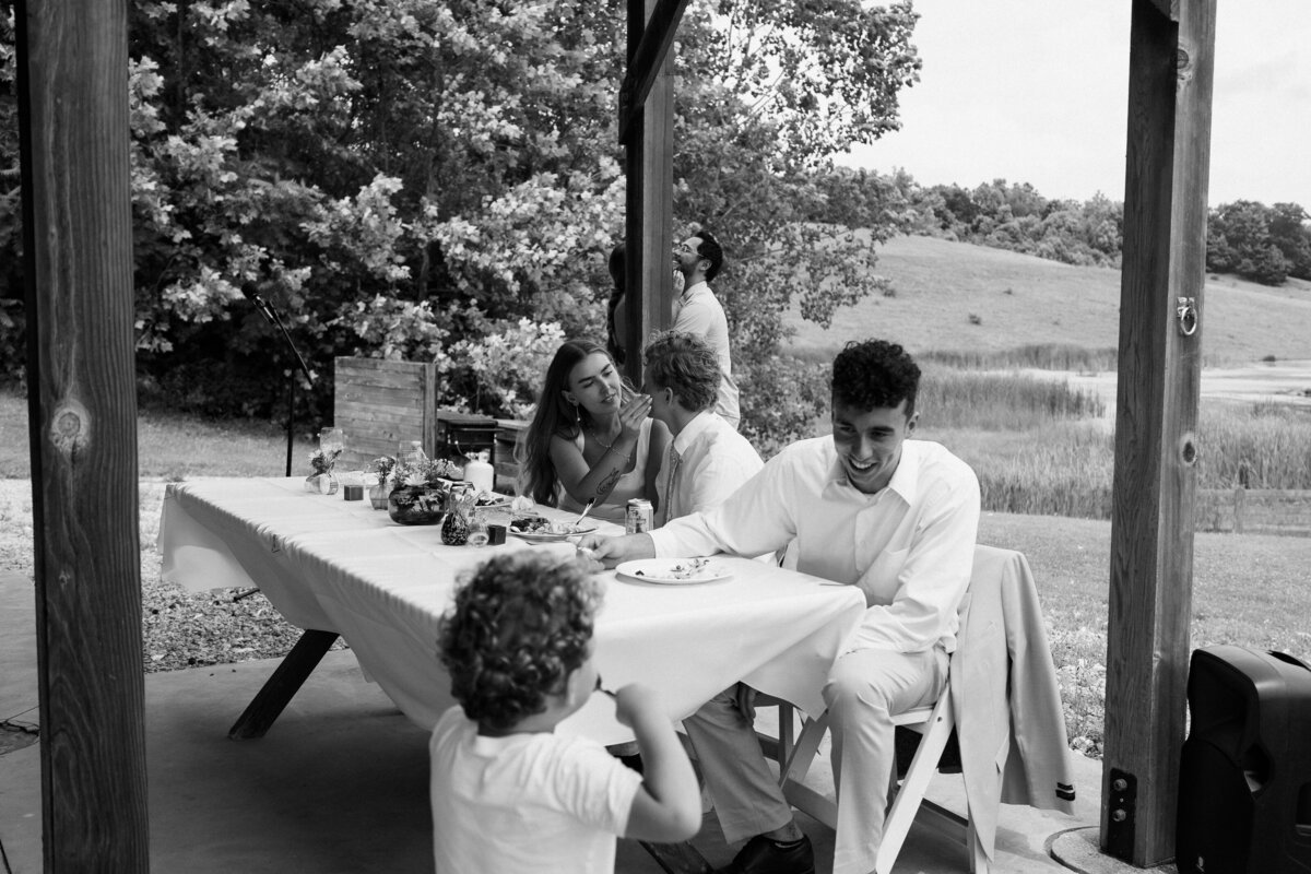 wedding guest interacting with young child