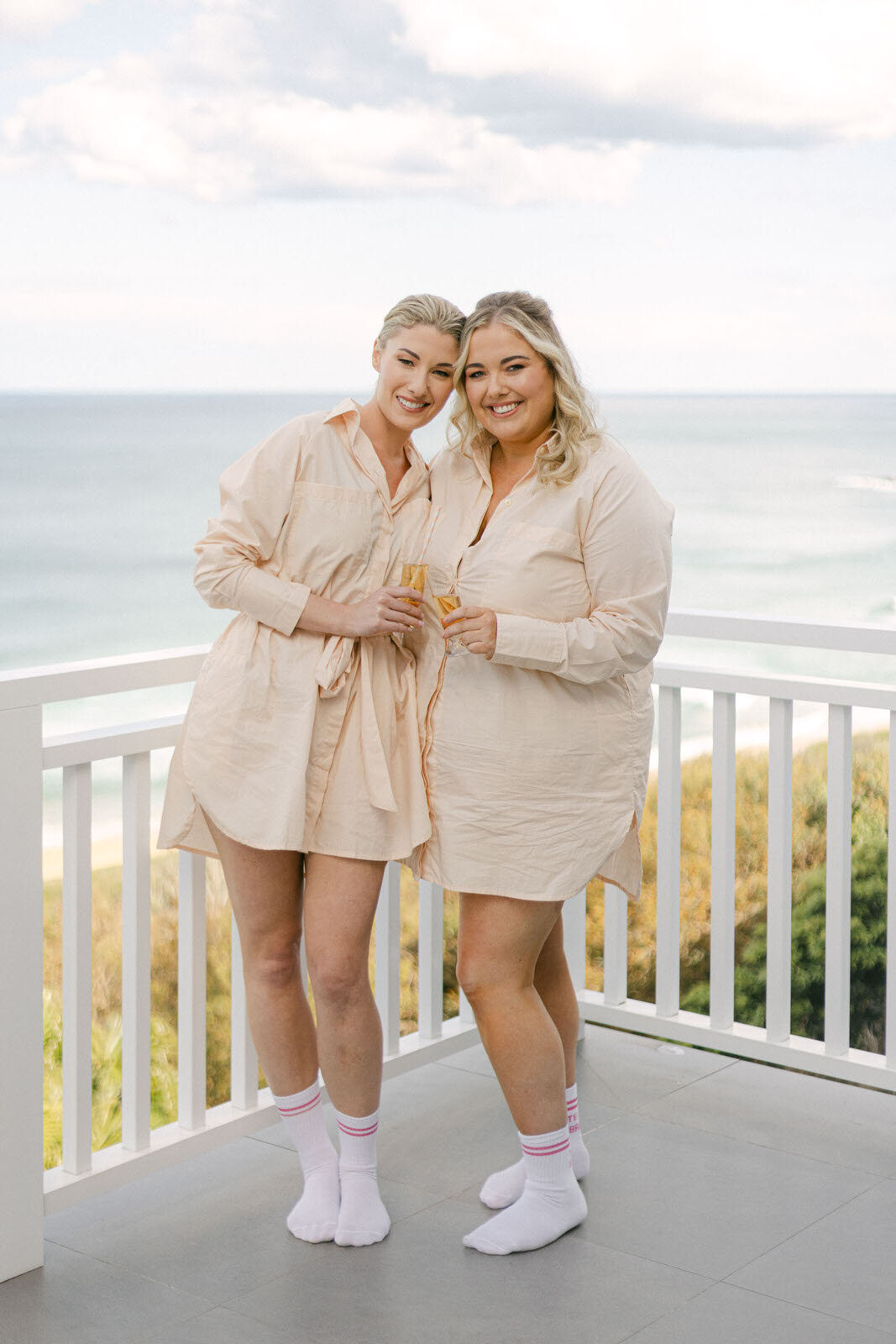bride and maid of honour wearing robe