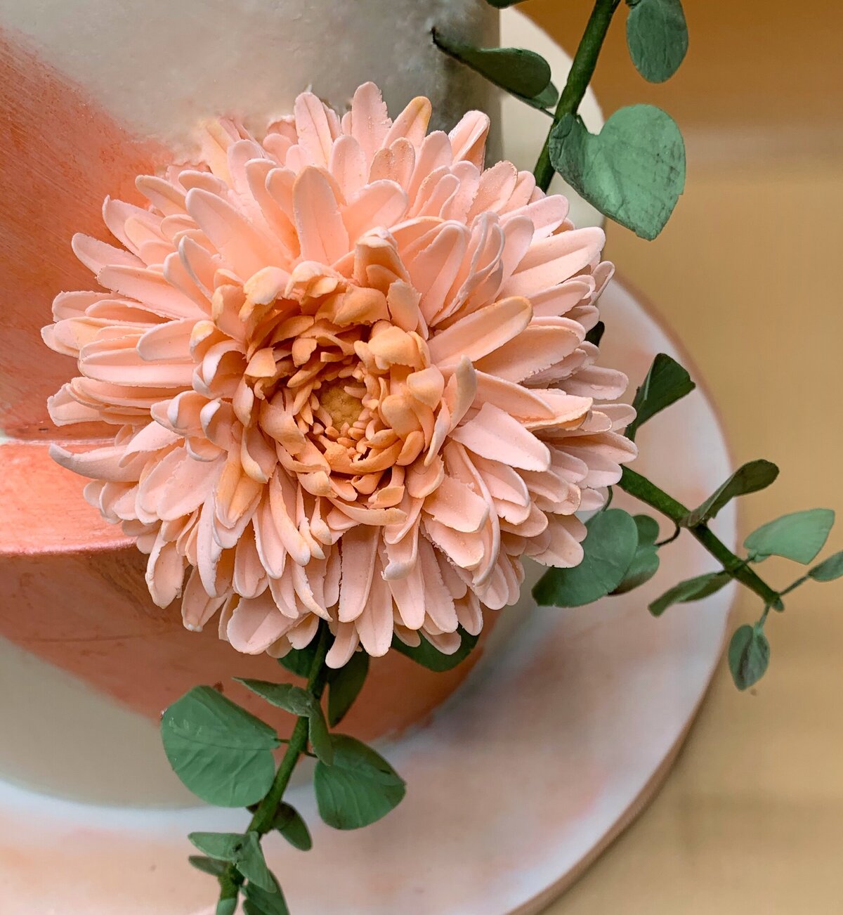 Large peach colored chrysanthemum sugar flower