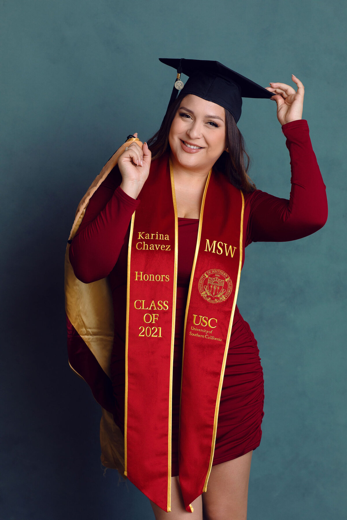 Graduation Portrait Of Young Woman In Red Dress Los Angeles