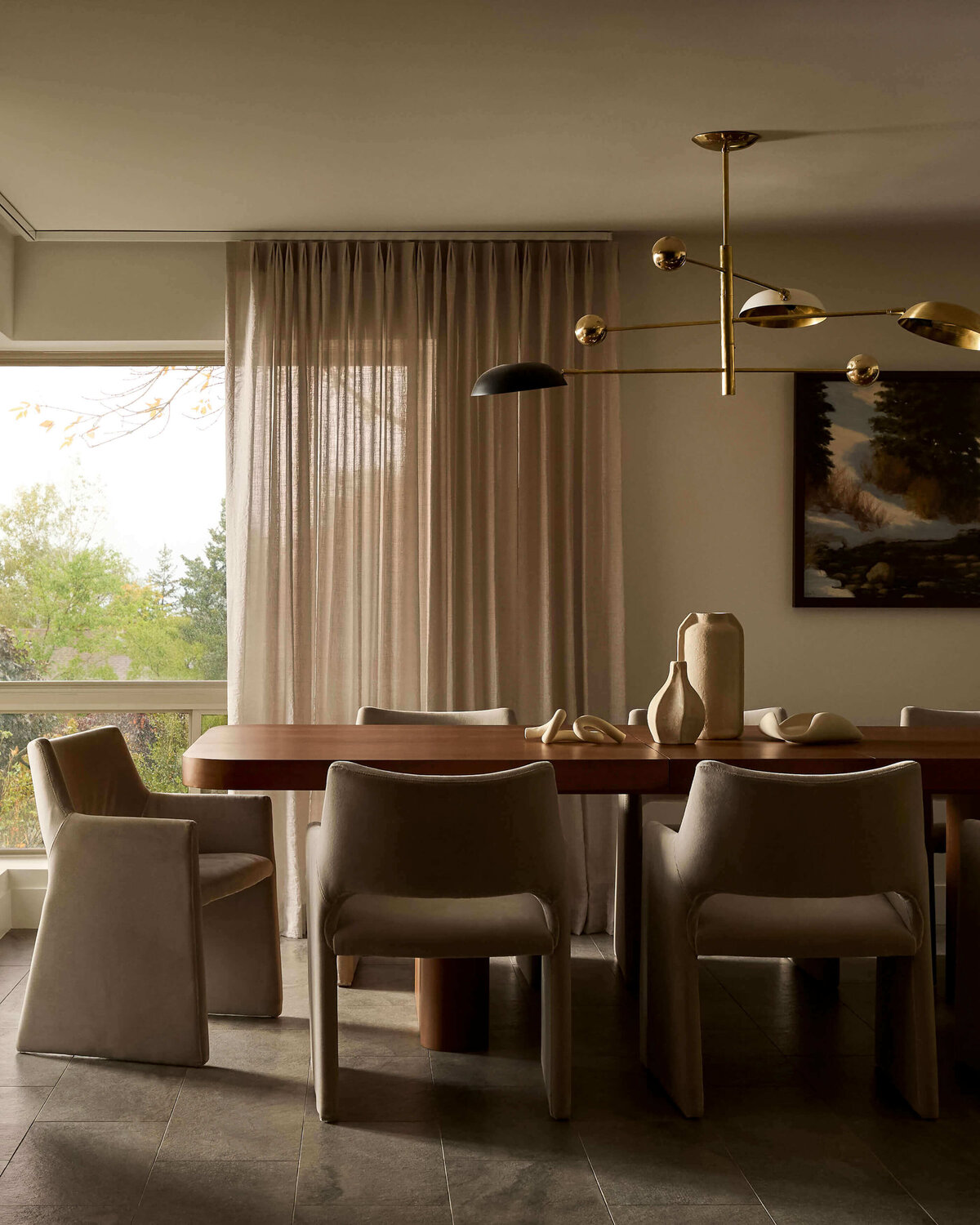 sculptural-dining-room-velvet-chairs-gold-light-fixture-wilmington-interior-designer