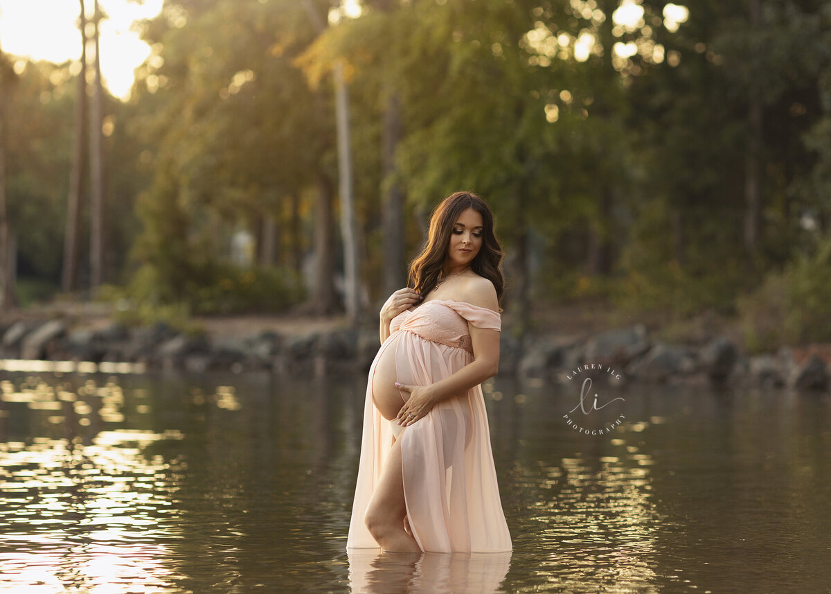 Maternity photography session at Jetton Park in the water at sunset