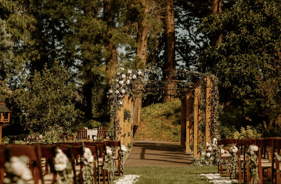 Aisle and Arbor with neutral florals