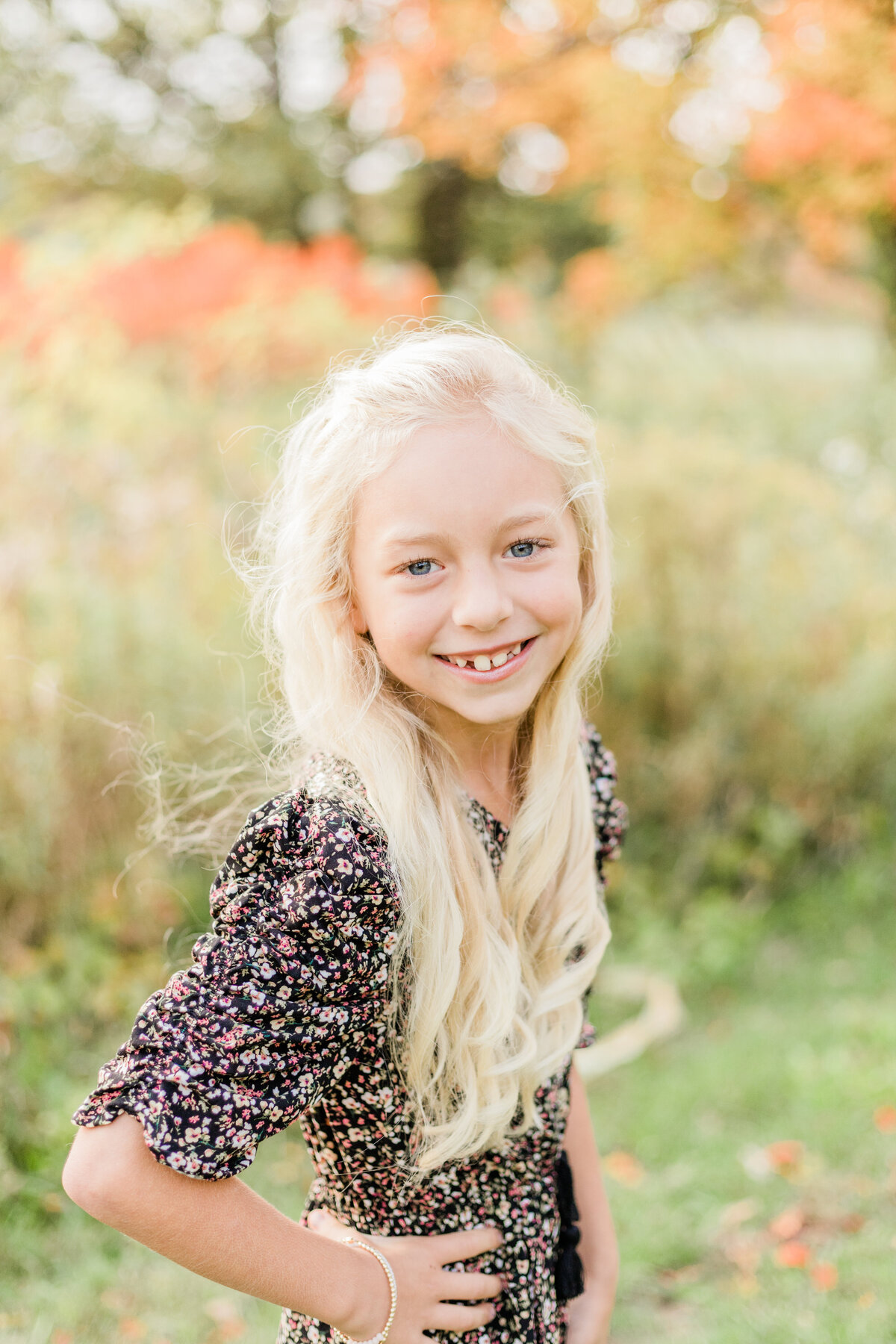 young girl smiling at the camera