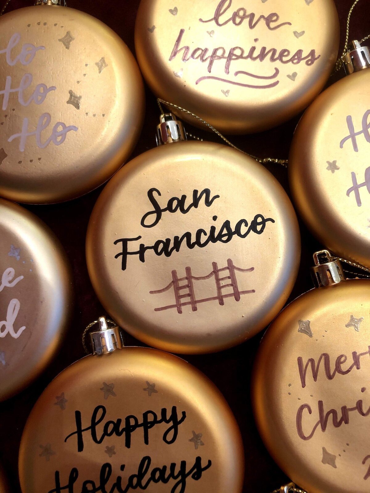 Christmas ornaments personalized on site with calligraphy