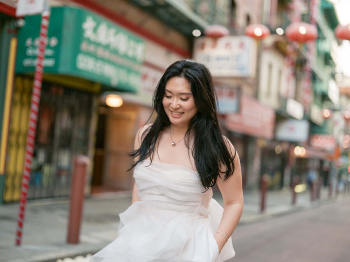 White MILLA ensemble engagement outfit San Francisco Chinatown photography session
