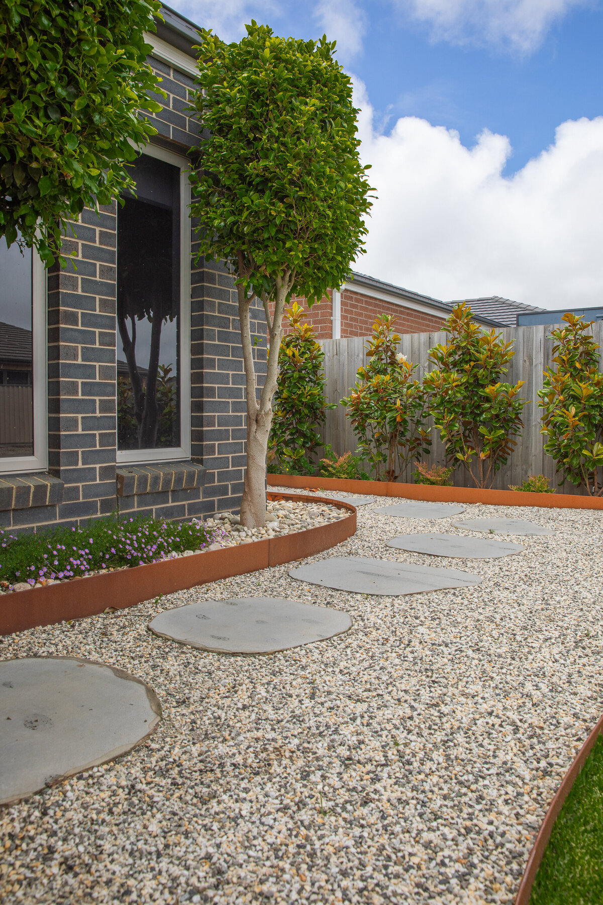 Paving and garden edging for low maintenance yard by total landscapes & design