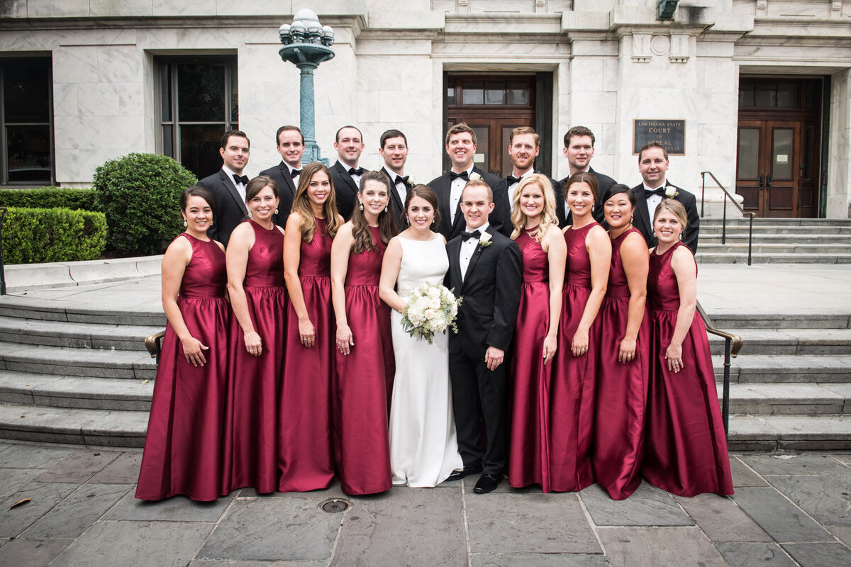 Wedding party group shot in front of Louisiana Supreme Court