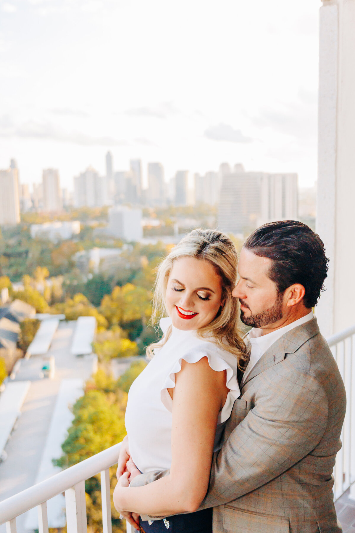 couple with downtown Houston in the  background