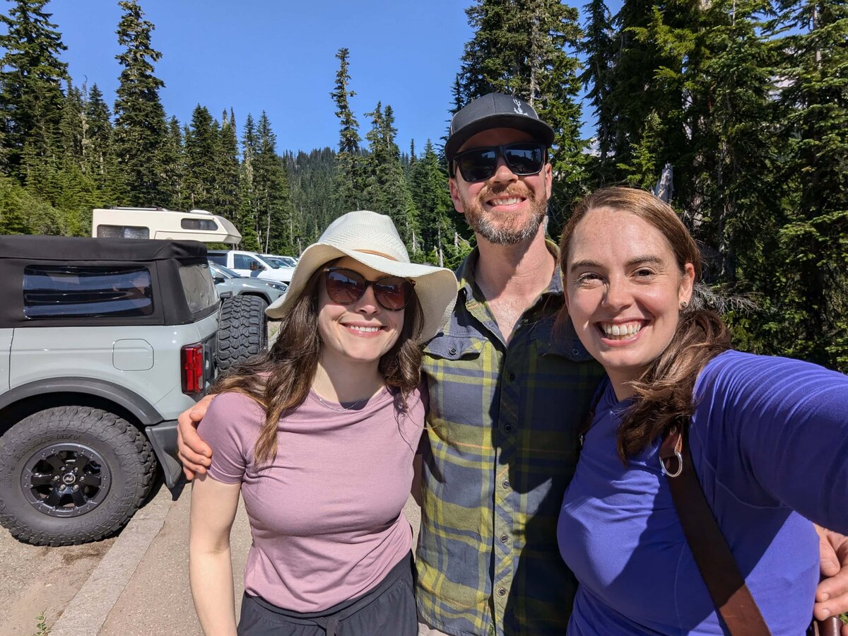 couple taking selfie with Sage Trails after Mount Rainier Elopement