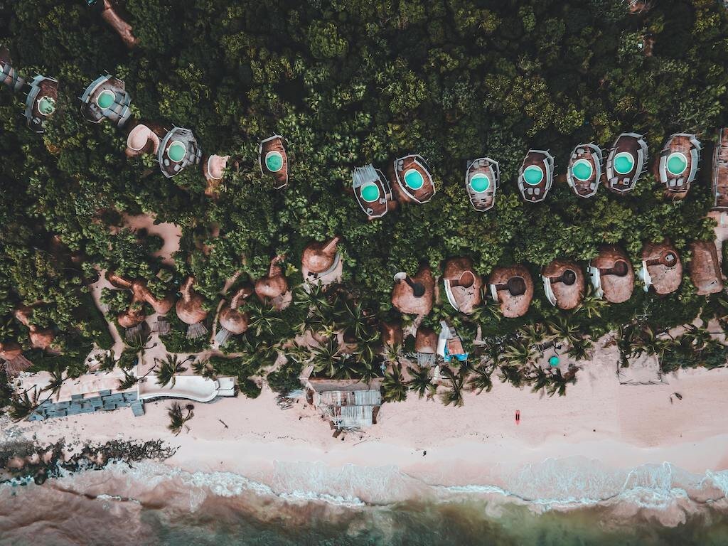 Escape to Tulum’s lush coastline and discover world-class wellness retreats nestled between jungle and sea. From eco-luxury villas to oceanfront yoga sanctuaries, embrace the essence of healing in paradise.