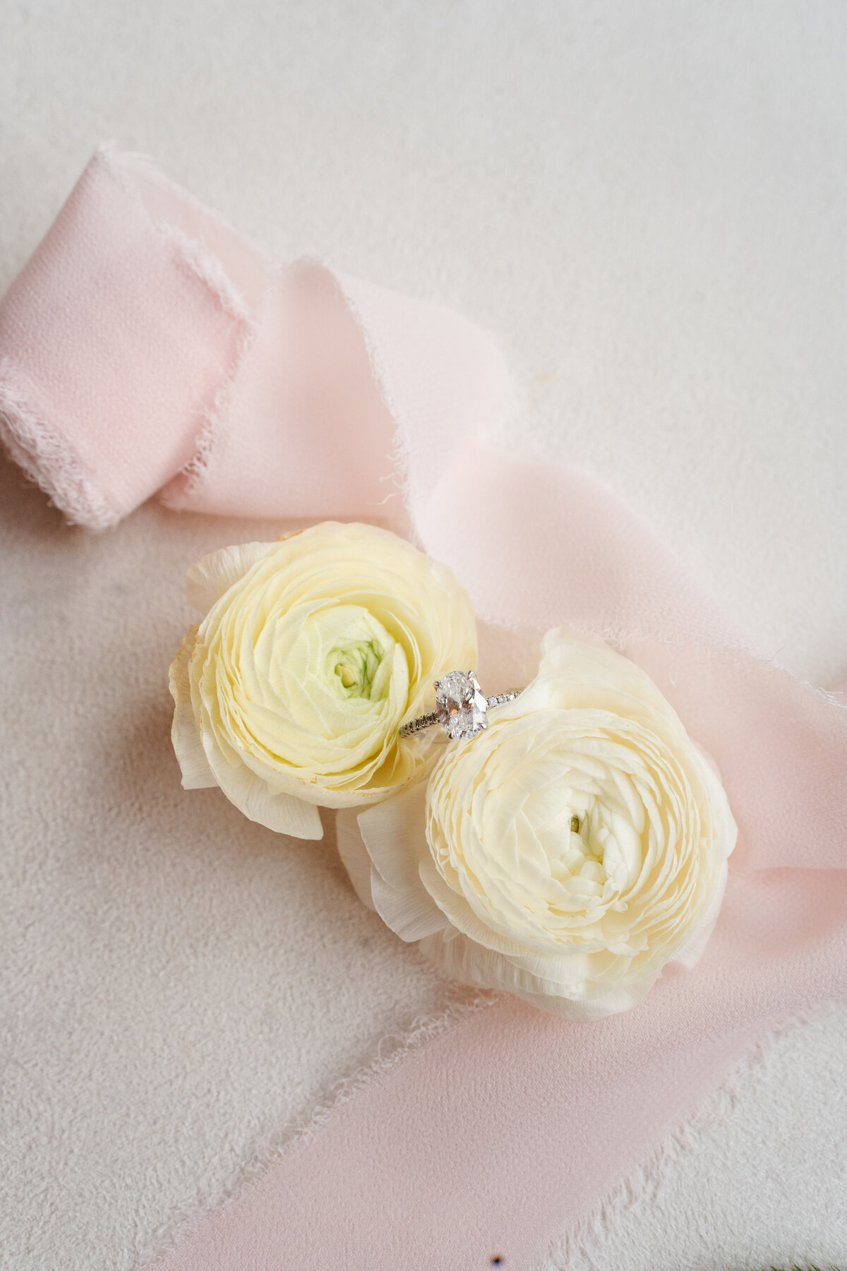 Rustic wedding details with greenery and neutral tones