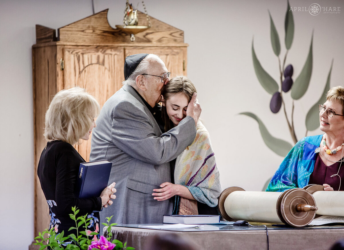 Grandpa Kisses His Granddaughter During her Bat Mitzvah Service in Lakewood CO