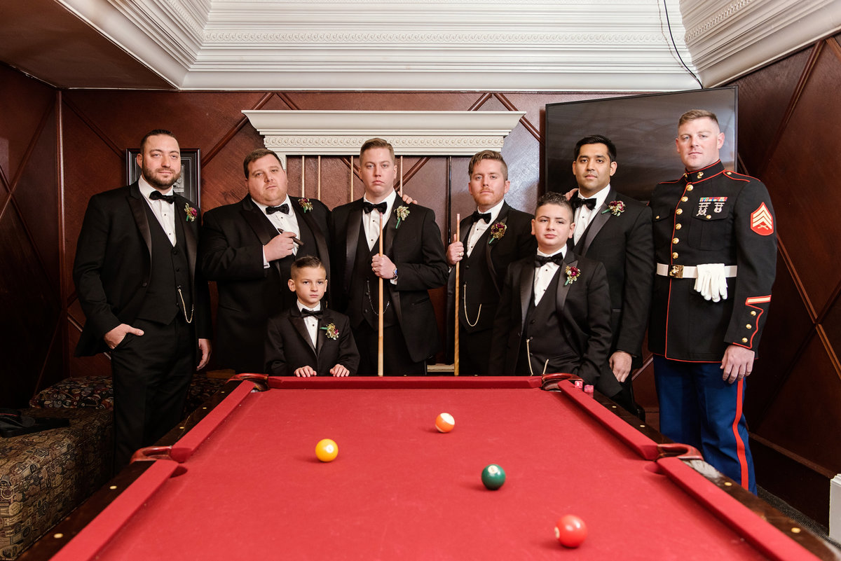 photo of groomsmen in billiards room from wedding at The Carltun